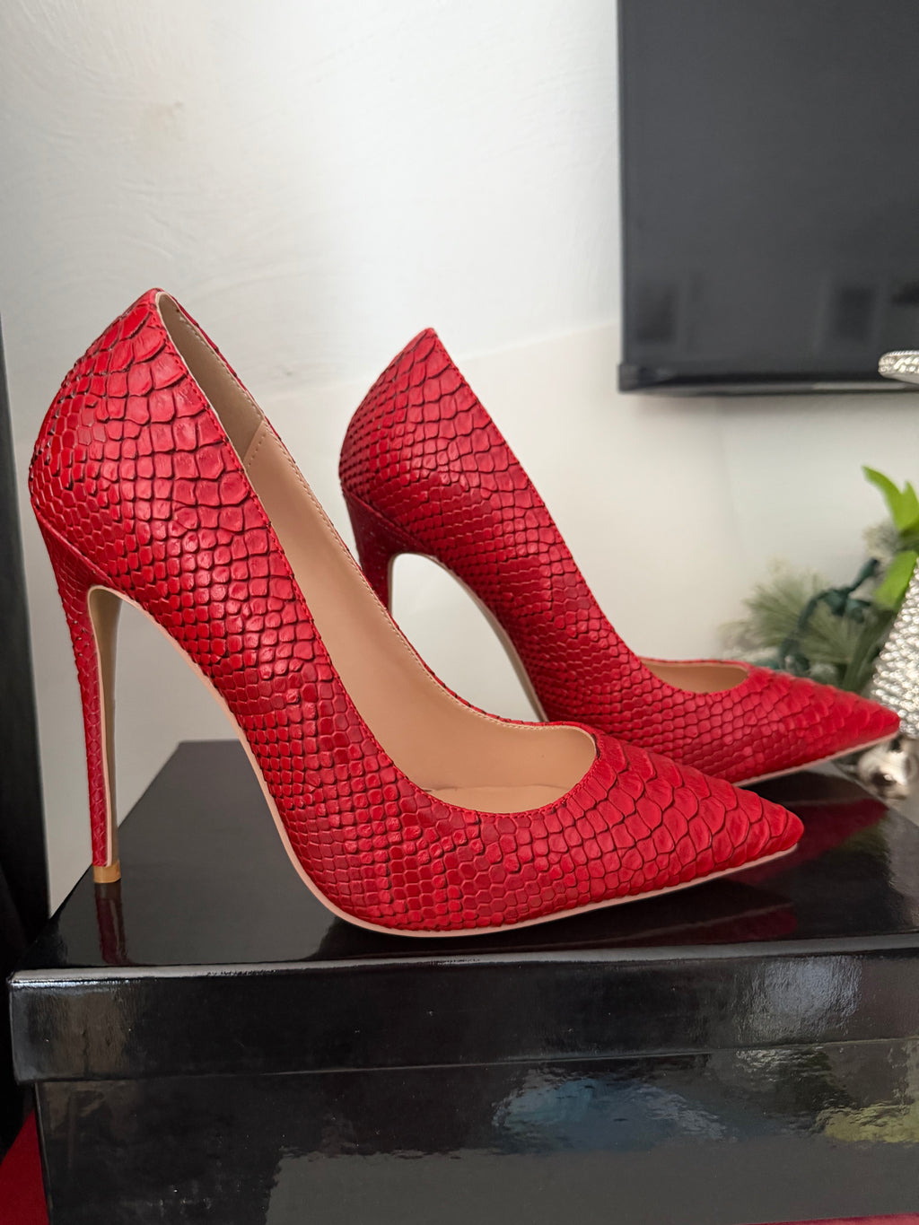Red Snake print pumps