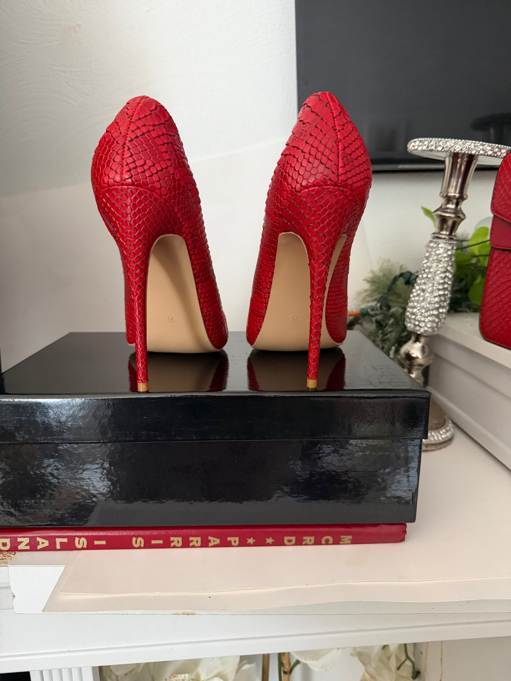 Red Snake print pumps