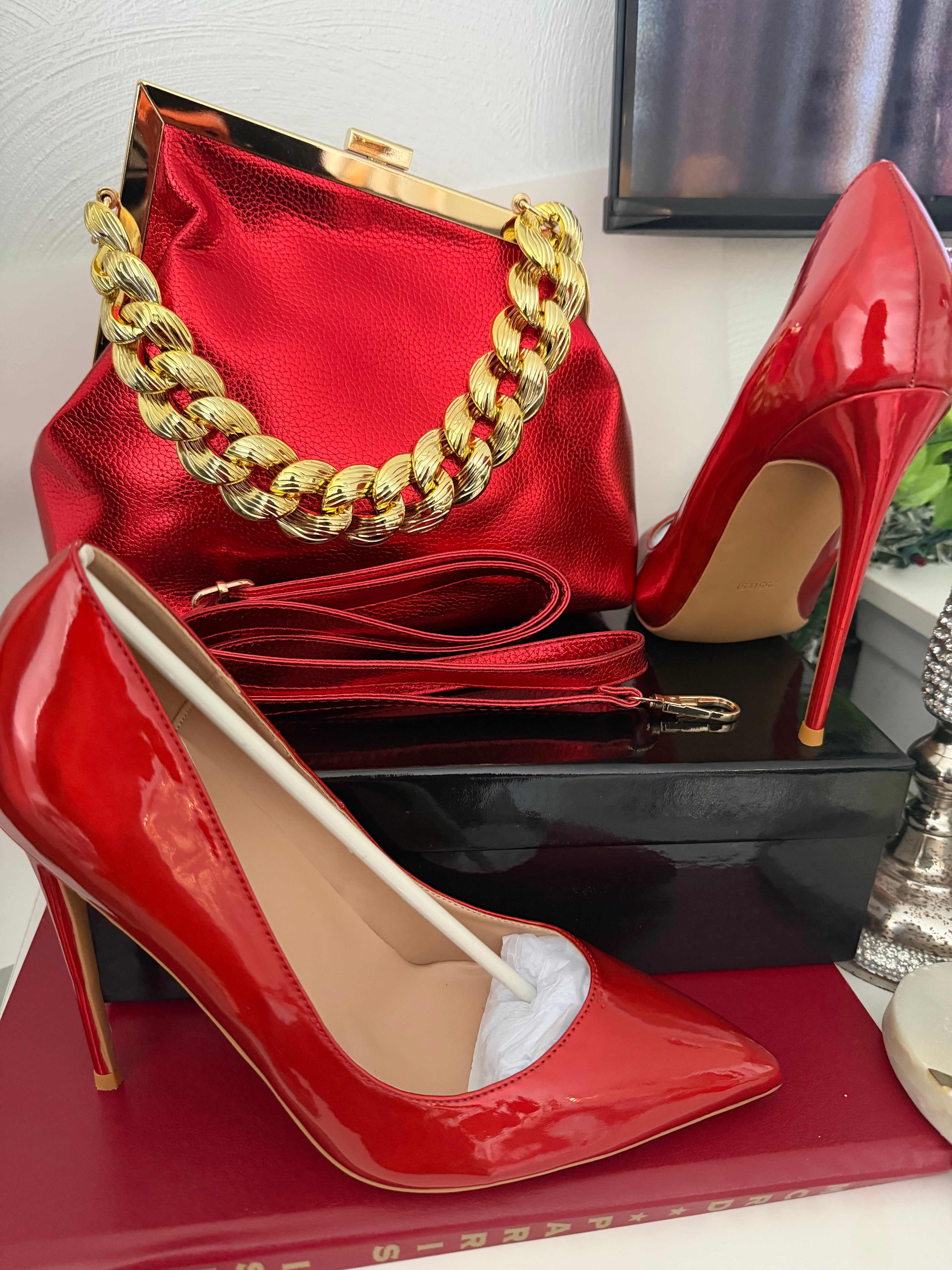 Vibrant Red Laser Stiletto Pumps and Metallic Red Clutch Purse Set – Luxury Chunky Gold Chain Handbag & Pointed Toe High Heels – Formal Gala & Evening Accessory Set