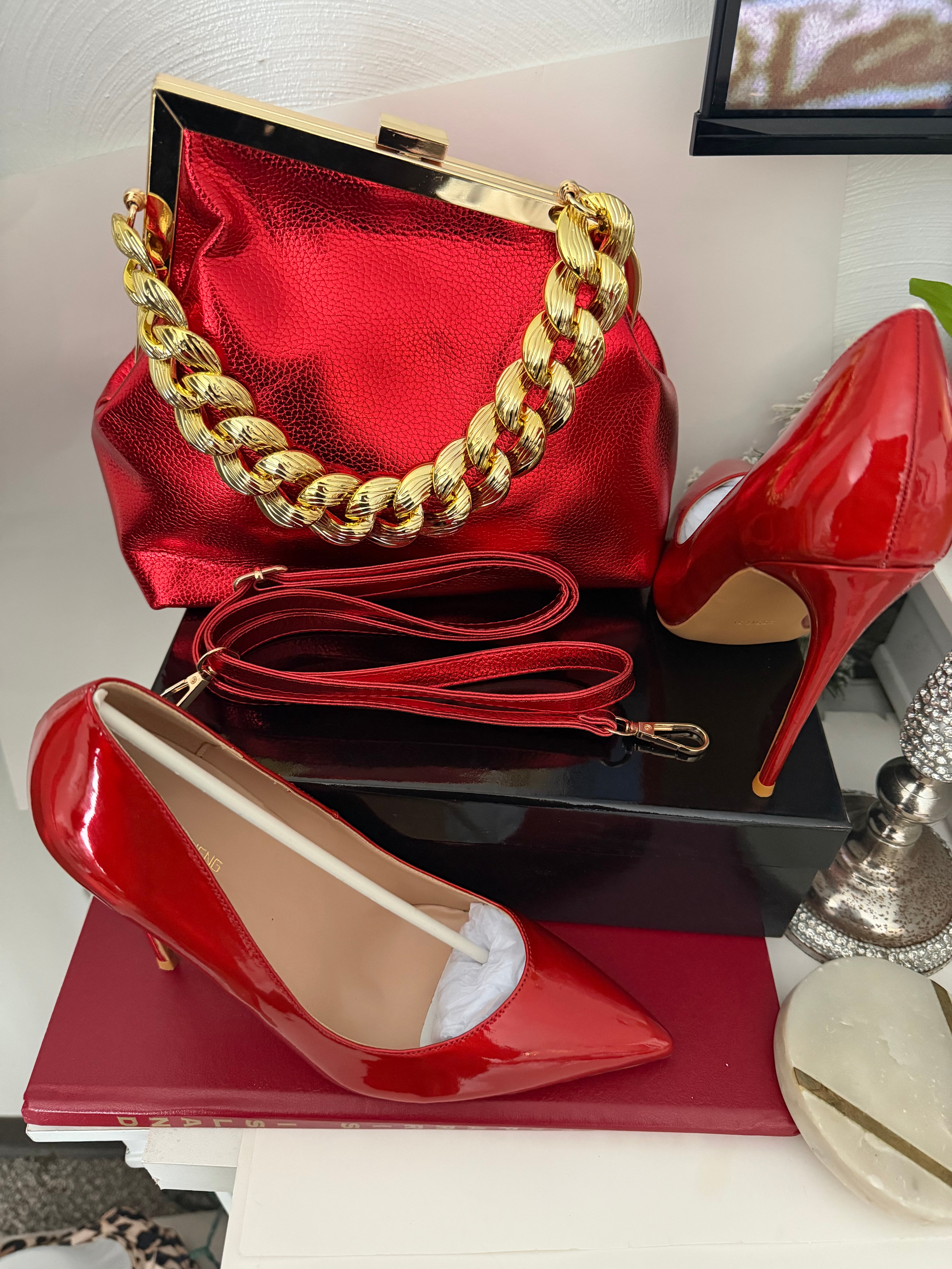 Vibrant Red Laser Stiletto Pumps and Metallic Red Clutch Purse Set – Luxury Chunky Gold Chain Handbag & Pointed Toe High Heels – Formal Gala & Evening Accessory Set