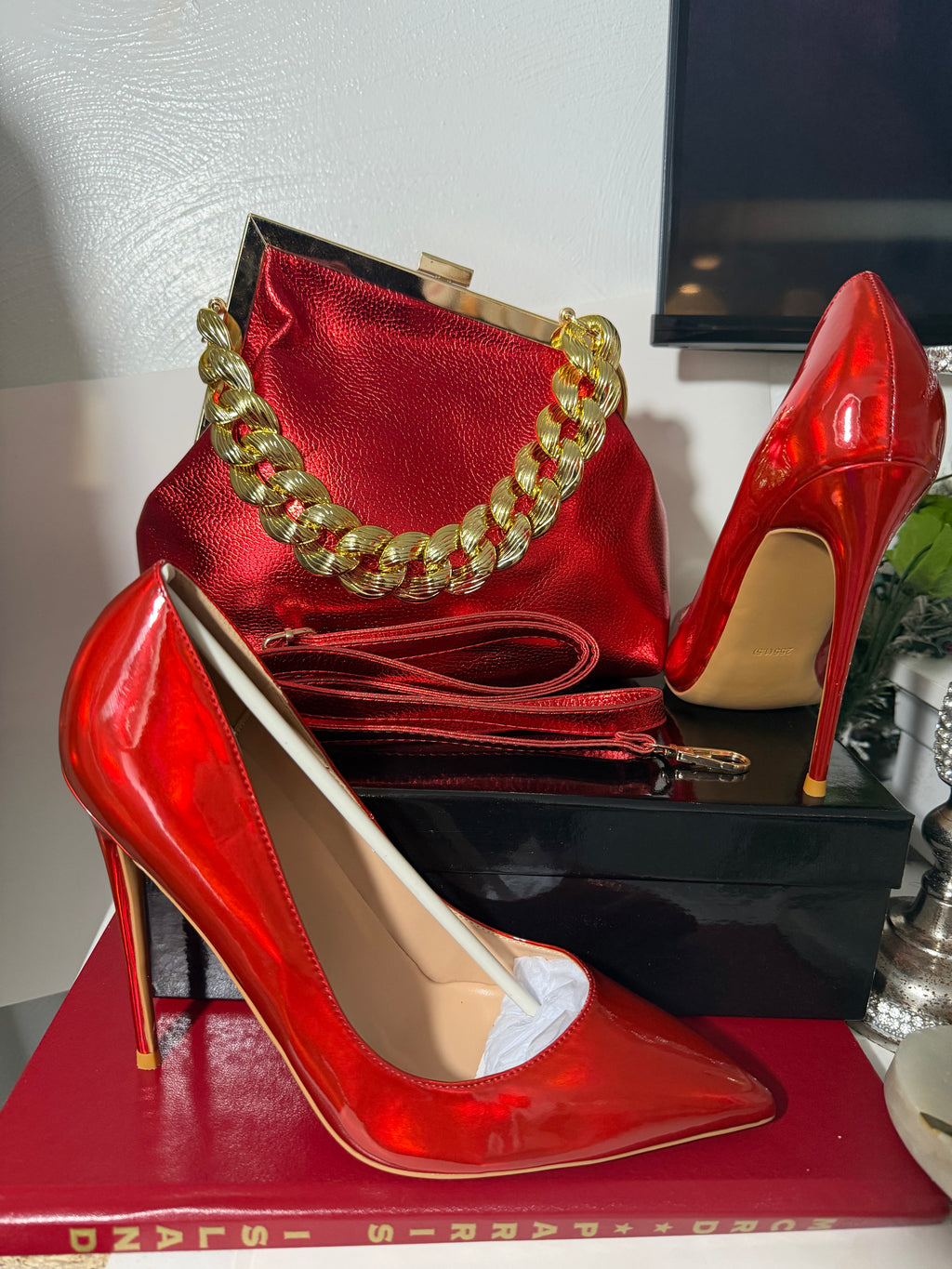 Vibrant Red Laser Stiletto Pumps and Metallic Red Clutch Purse Set – Luxury Chunky Gold Chain Handbag & Pointed Toe High Heels – Formal Gala & Evening Accessory Set